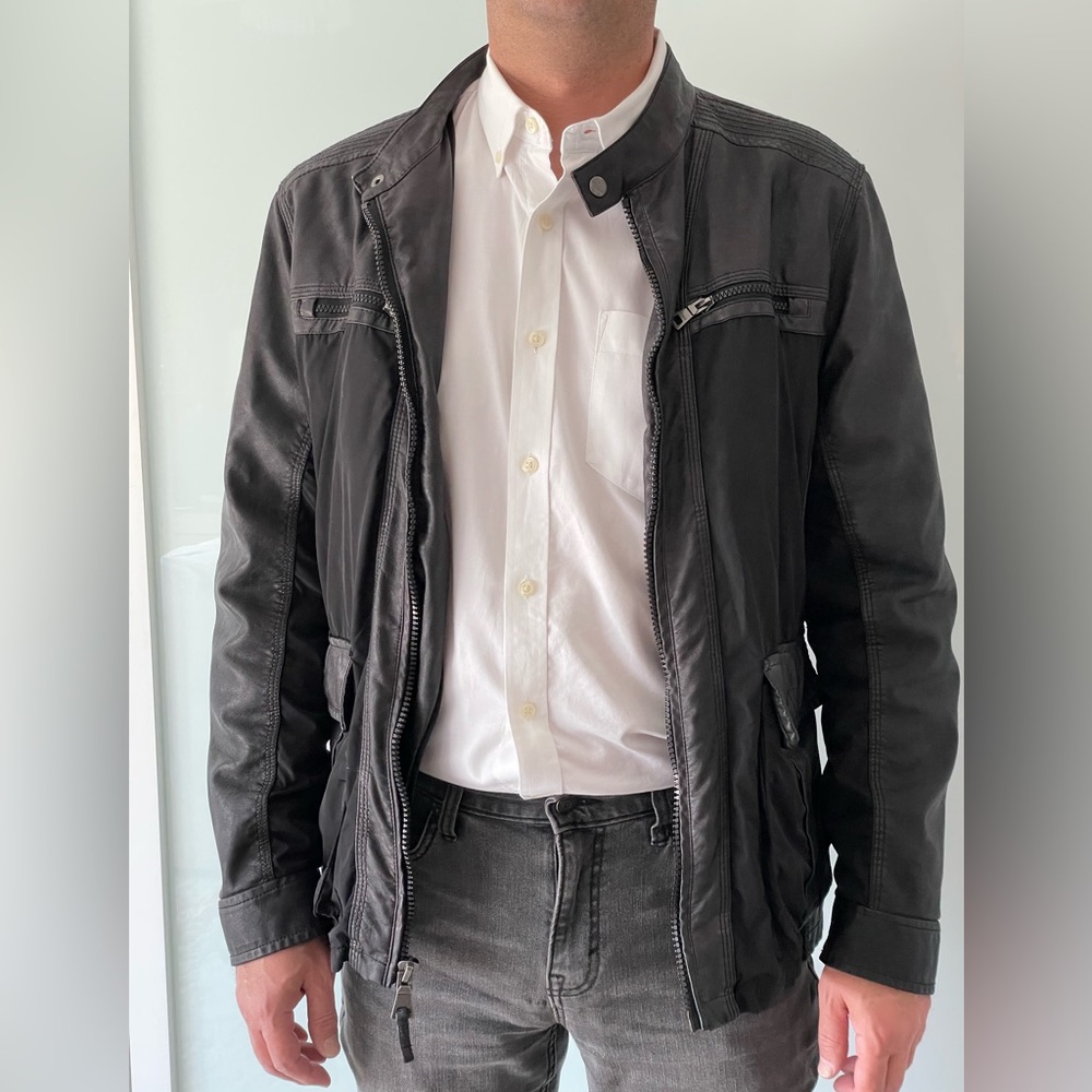 Used vegan leather moto jacket. Size M.